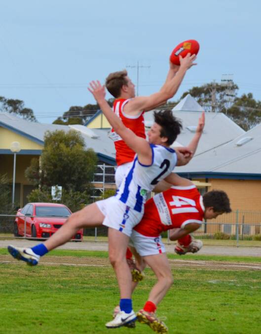GRAB: Hopetoun's Zac Robins marks against Walpeup-Underbool at the weekend. Picture: HOPETOUN COURIER