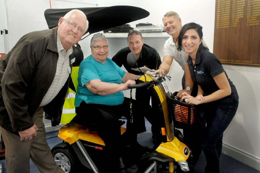 Wimmera Mobility Group president Geoff Baker, secretary Elaine Cooper, Horsham Action Aids Australia’s Bronson Young, Blue Badge Insurance’s Nik Witcombe and Shirin Akhyani at a mobility scooter safety day. Picture: SAMANTHA CAMARRI