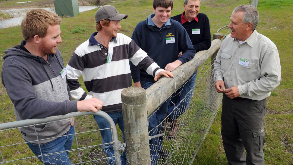 BRAINSTORMING IDEAS: Wimmera farmers Brad Teasdale, Jono Alexander, George Hepburn and Greg Lees chat to guest speaker Jay Fuhrer during a break in the Victorian No-Till Farmers Association conference at the Grains Innovation Park in Horsham. Picture: PAUL CARRACHER
