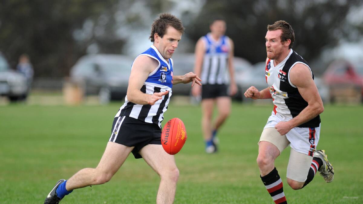 CONCENTRATION: Minyip-Murtoa's Liam Newell gets a kick away. Picture: SAMANTHA CAMARRI