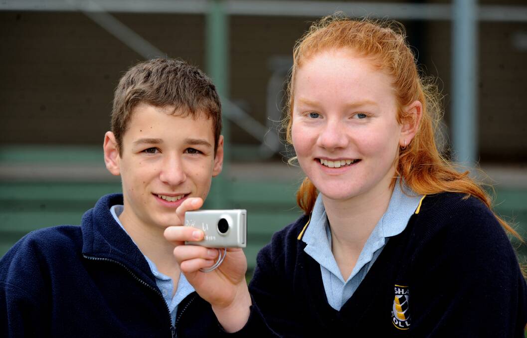 FILM FOCUS: Horsham College year nine students Luke Busbridge and Georgia Maroske encourage people to enter short videos in their film festival showing what they love about Horsham. Picture: SAMANTHA CAMARRI