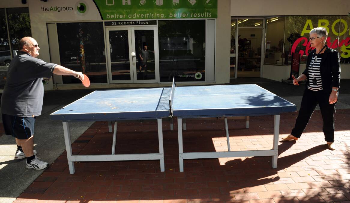 Francis Pekin and Mary Smith have a hit of table tennis to promote World Table Tennis Day on April 7. Picture: PAUL CARRACHER
