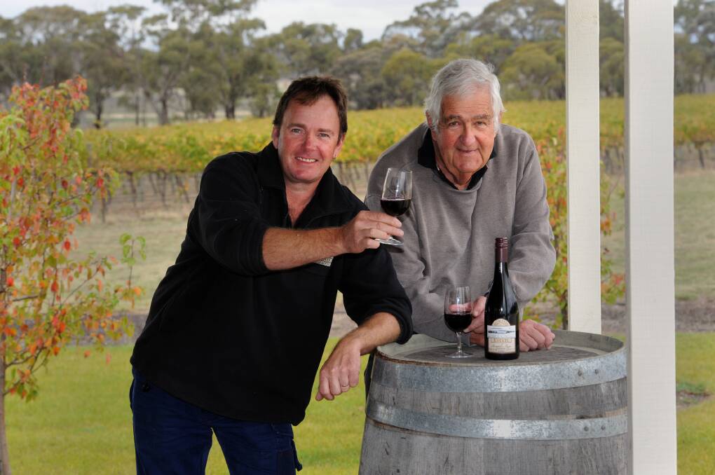 TOP DROP: Norton Estate Wines manager Chris Spence, left, and owner Don Spence celebrate a good harvest. Picture: PAUL CARRACHER