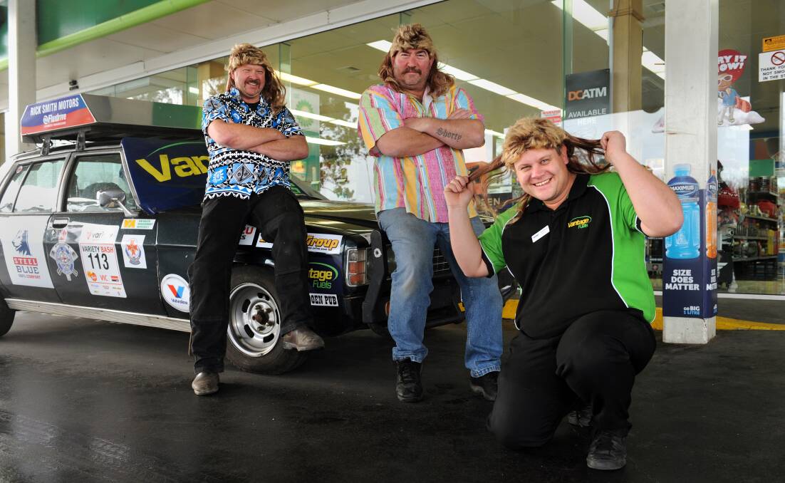 READY TO ROLL: Variety Bash entrants Rick Smith and Mick Harris with sponsor Nathan Werner at Horsham's BP Dimboola Road. Picture: PAUL CARRACHER