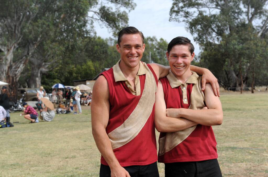IN STYLE: Brothers Zack and Alan Jorgensen-Price, in their costumes for The Dressmaker, have enjoyed working with Hollywood star Liam Hemsworth – thanks to mum of course. Picture: KELLY McRAE