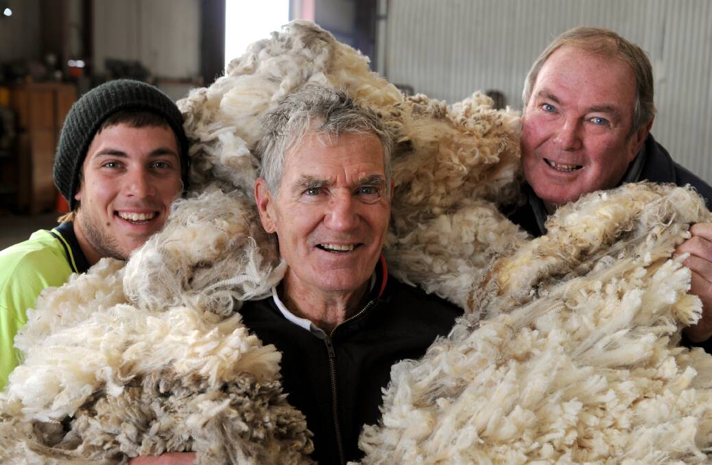 FINEST FLEECE: Horsham Agricultural Society junior president Dalton Cross, Wimmera Legacy’s Bill McGrath and Horsham Wool’s Rob Nelson encourage wool producers to enter the Horsham Show Fleece Competition and the Wimmera Legacy Fleece Show.Picture: PAUL CARRACHER