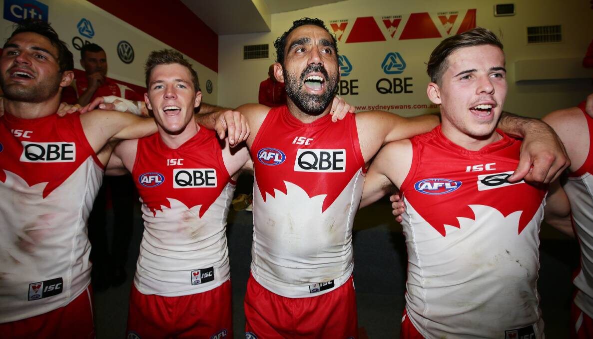 Adam Goodes with his team-mates after a win.