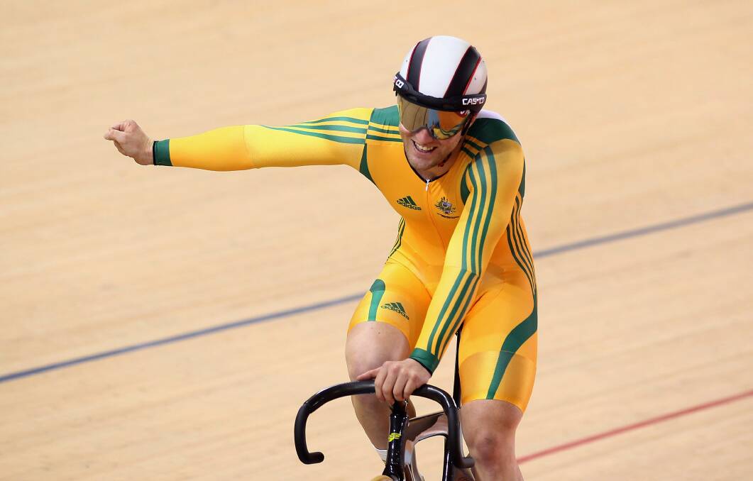 Jason Niblett celebrates his team's gold medal after winning the team sprint cycling at the 2010 Delhi Commonwealth Games. Picture: GETTY IMAGES