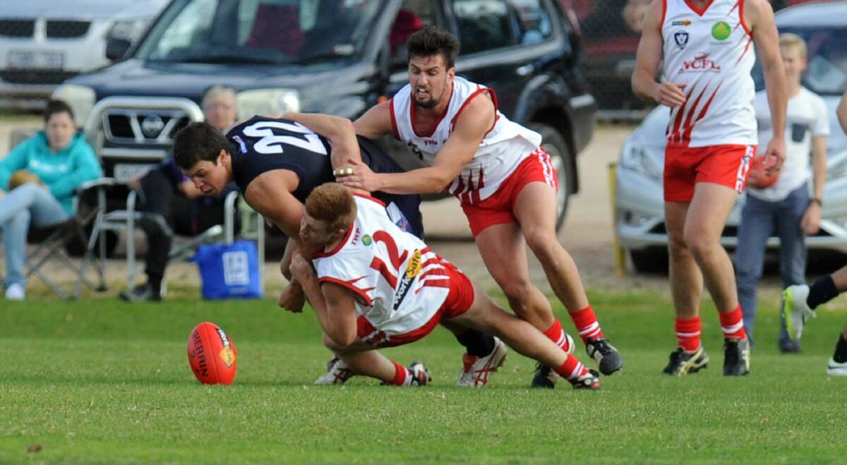 Wycheproof-Narraport coach Boe Bish, pictured tackling Lachie Exell during interleague, will be a worry for Donald at the weekend. Picture: PAUL CARRACHER