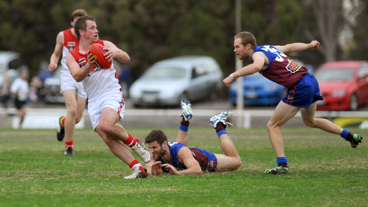 Ararat midfielder Aaron Searle, pictured playing against Horsham last week, went down injured in his side's win over Nhill on Saturday. Picture: SAMANTHA CAMARRI