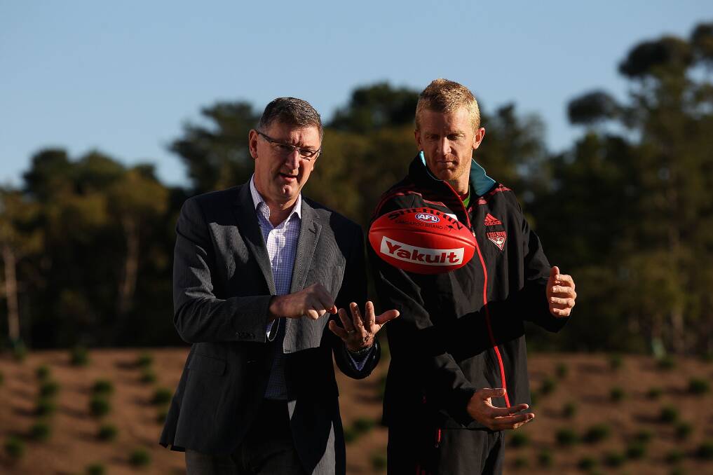 LEGEND COMING: Former Essendon star and games record holder Simon Madden, pictured with the club’s new games record holder Dustin Fletcher this year, will speak at a Dimboola Football Netball Club function this month. Picture: GETTY IMAGES