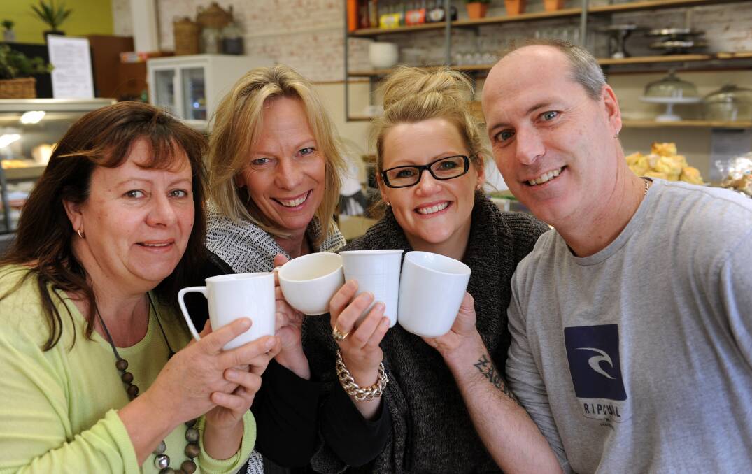 CUPPA FOR A CAUSE: Café Chickpea owner Lyn Witney-Drum, Business Horsham executive administrator Wendy Mitchell, Café Jas owner Sharron Keating and Fig Tree Café owner Brad Koenig raise a glass for CafeSmart, which raises money for tackling homelessness through coffee sales. All three cafes will donate $1 from each coffee sale to the initiative on Friday. Picture: PAUL CARRACHER
