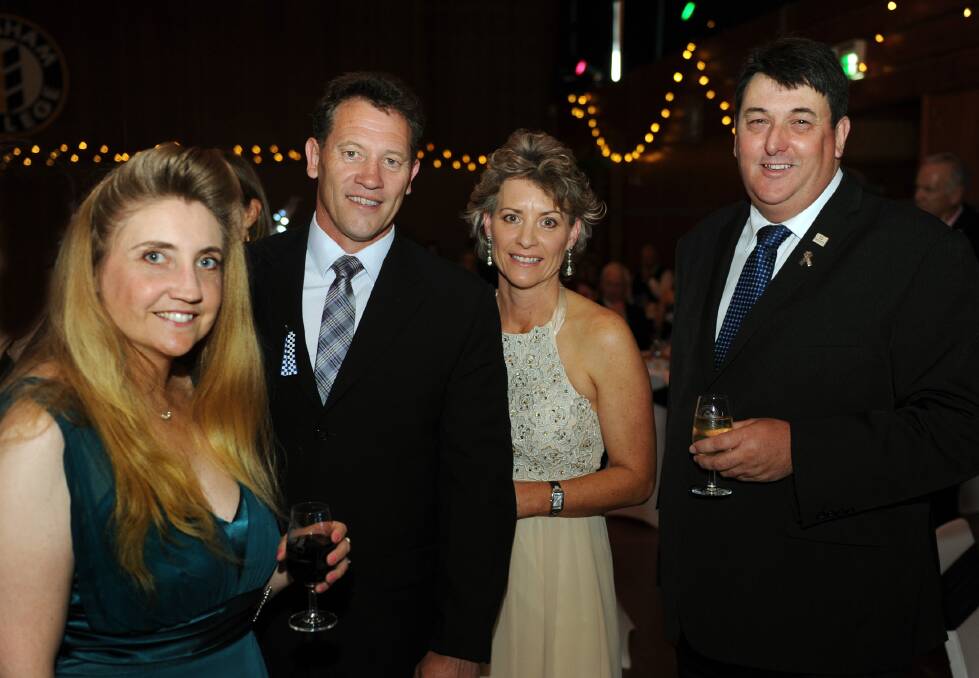 Alison Lord, Brendan Broadbent, Sue Broadbent and Geoff Lord at last year's ball. This year's event has been postponed. Picture: PAUL CARRACHER