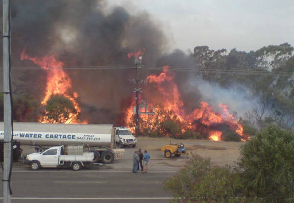 BLACK SATURDAY: Fire at the intersection of Plozzas Road and Hamilton Road, Haven. Picture: CONTRIBUTED
