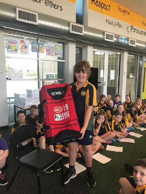 SPECIAL GIFT: Horsham West Primary School year four student Jesse Taylor shows off the bag he received from his friend Tom Lynch. Picture: CONTRIBUTED