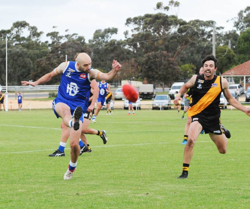 KICK: Donald's Anthony Raso gets the ball moving forward against Sea Lake-Nandaly in round four. His side will have its work cut out for it in round five against Wycheproof-Narraport. Picture: BULOKE TIMES