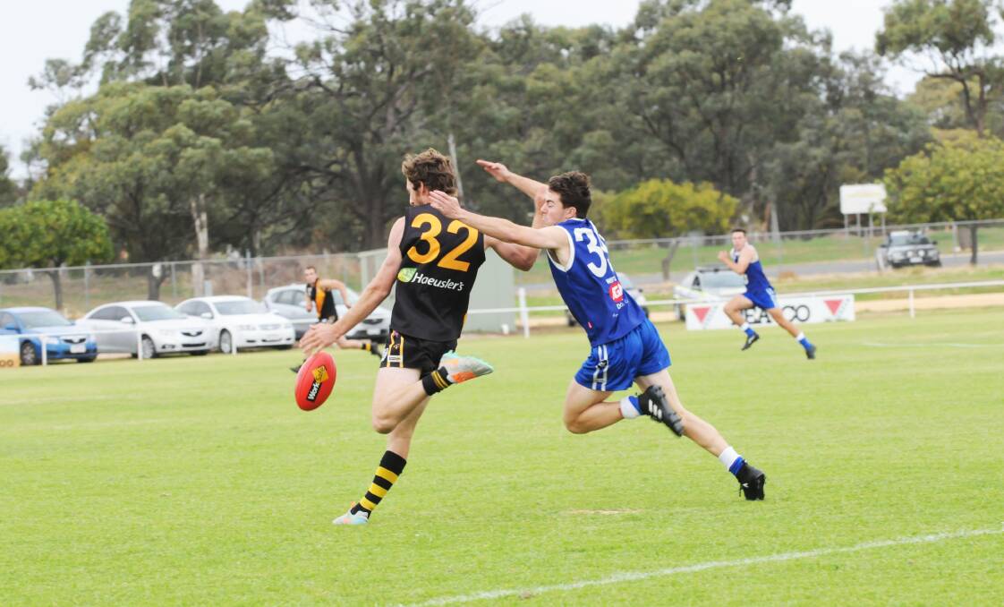 Darby Harrison lays a tackle against Sea Lake Nandaly in round four. Harrison kicked two goals on Saturday and was one his side's best players. Picture: BULOKE TIMES