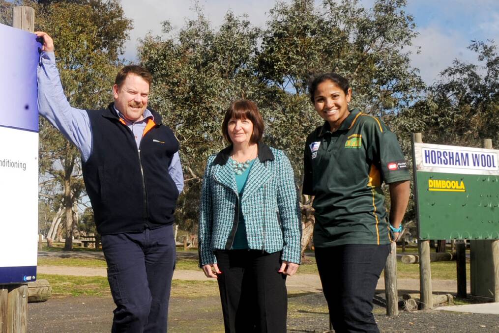 LONG TIME: Dimboola Football Netball Club president Col Campbell, Hindmarsh Shire Coucillor Debra Nelson and Dimboola netball director Ant Toet show where the change rooms will go after the successful grant application in 2016. Picture: SAMANTHA CAMARRI 
