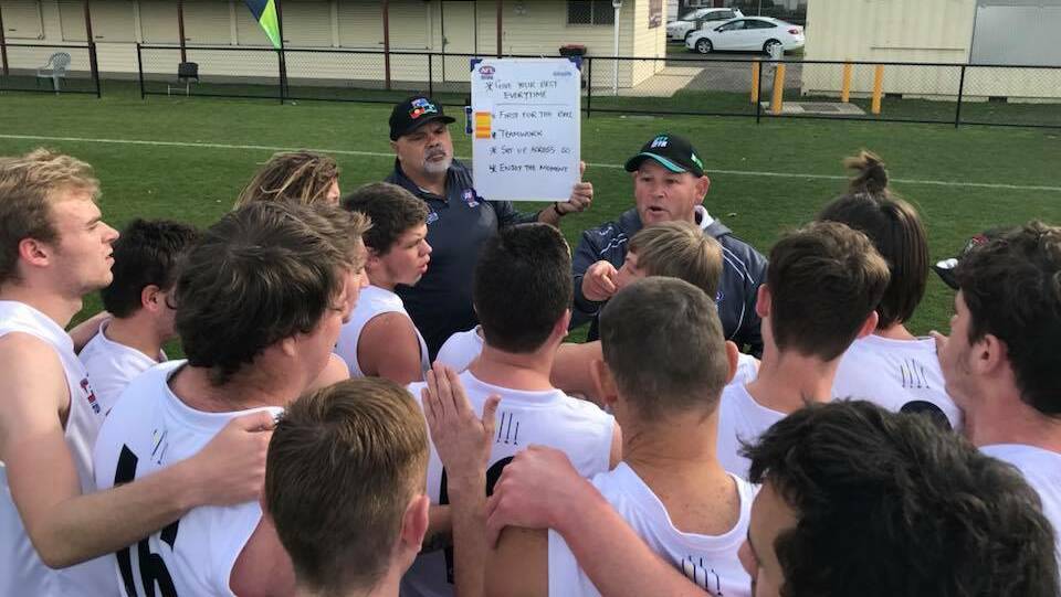 TEAM: Vic Country coach Steve Reeves addresses his team during its win against Queensland on Wednesday. Picture: CONTRIBUTED