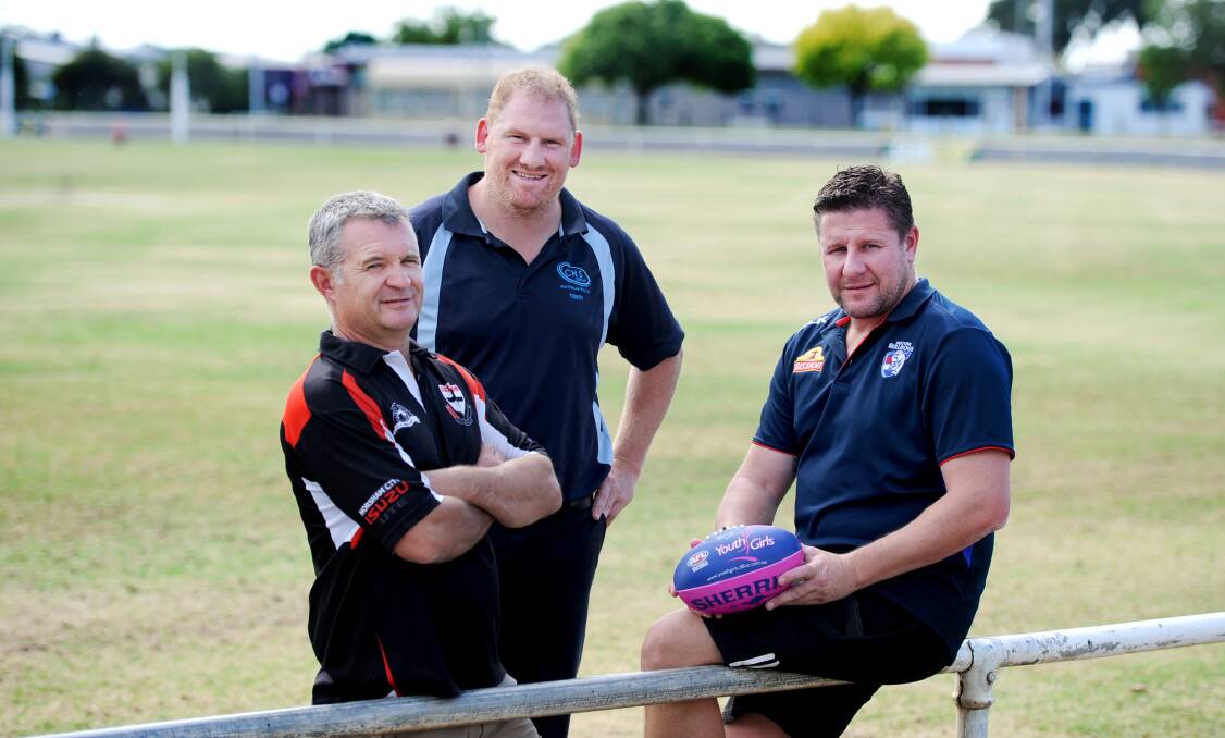 LEAGUE OF THEIR OWN: Horsham Saints president Mick Morris, Horsham Demons football director Terry Arnel, Football Development Manager Jason Muldoon are excited for the girls compeition. Picture:  SAMANTHA CAMARRI