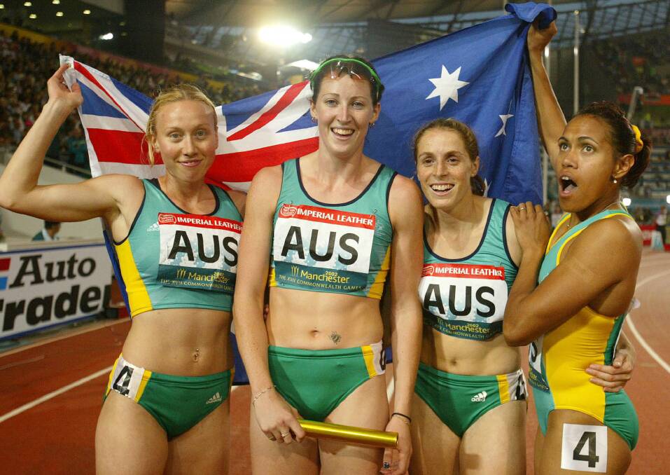 GOLD: Tamsyn Lewis, Jana Pittman, Lauren Hewitt and Cathy Freeman celebrate after winning the gold medal in the 4x400 metre relay at the 2002 Commonwealth Games in Manchester. Picture: AP IMAGES