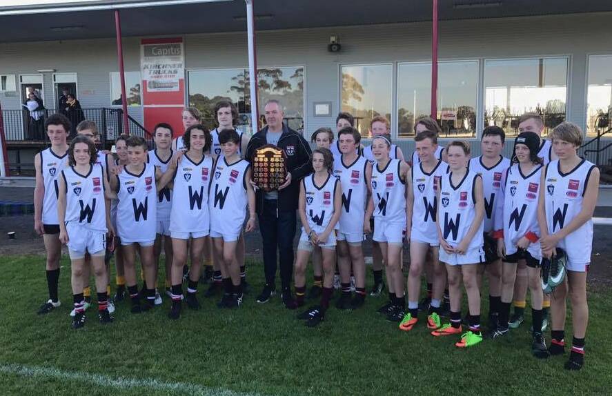Brendan Bryan and the victorious Wimmera White under-14 team after Sunday's carnival.