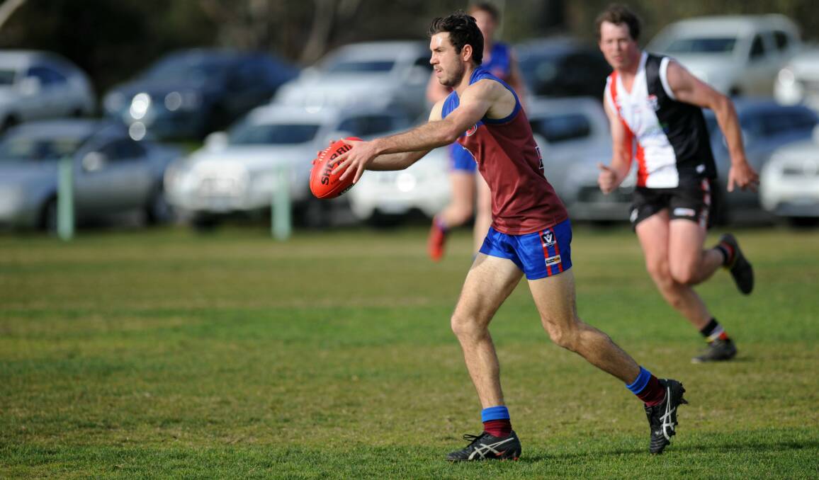 CONTROL: Ryan Kemp has continued to be an important player for the Horsham Demons all season. Picture: STUART McGUCKIN