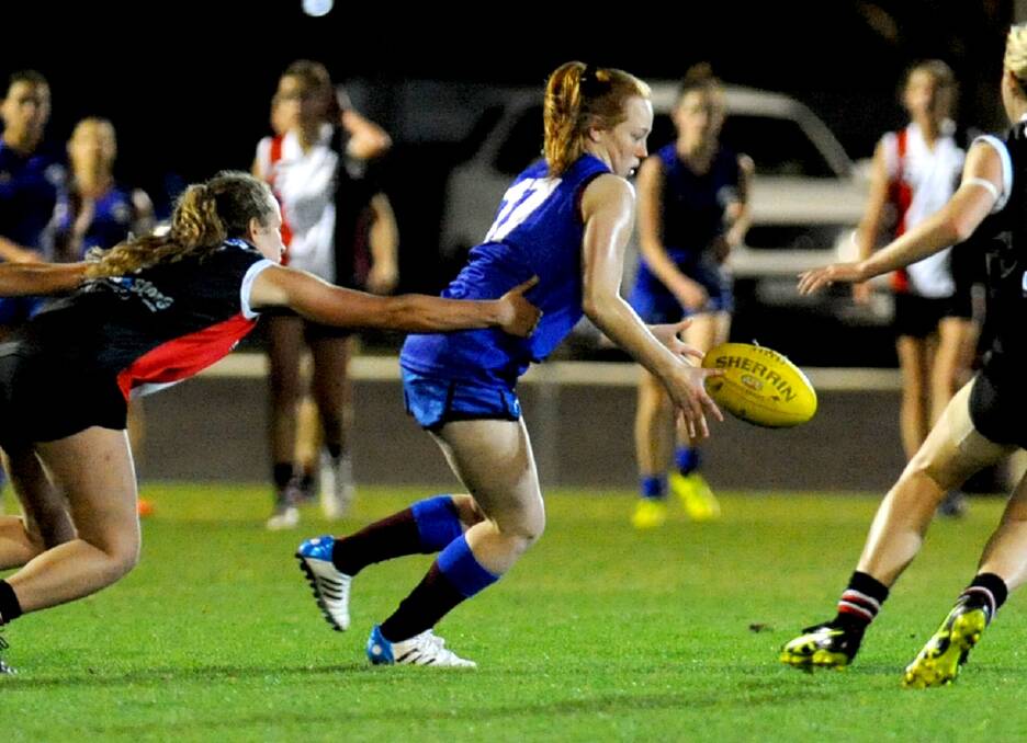SKILLED: Horsham Demons' Abby Hallam gets a kick away against the Saints in 2017. Hallam was one of her side's best on Friday. Picture: SAMANTHA CAMARRI
