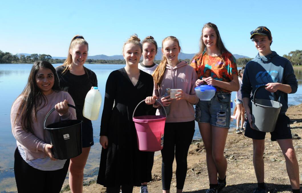 EXPERIENCING:  Hajra Hanif, Caitlin Burger, Imogene Tonks, Emma Blackie, Aylish O'Donohue, Nikki Slorach and Eric Peter collected water from Green Hill Lake along with the rest of the Marian College student cohort. Picture: STUART McGUCKIN