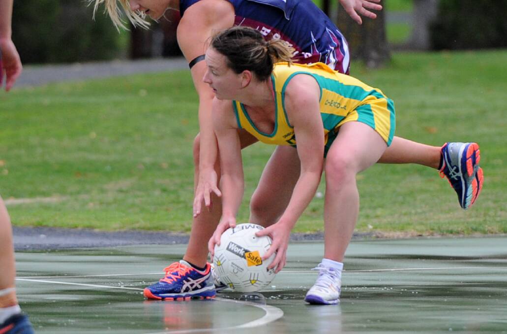 LEADER: Dimboola's Jodie Hayes collects a low ball against Horsham during the 2017 Wimmera Netball Association season. Picture: SAMANTHA CAMARRI