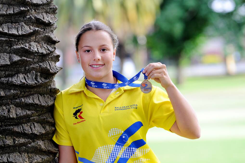 NEW CHALLENGE: Miette Hopper with the gold medal she won at state championships in February. This week she will compete at the national level. Picture: SAMANTHA CAMARRI