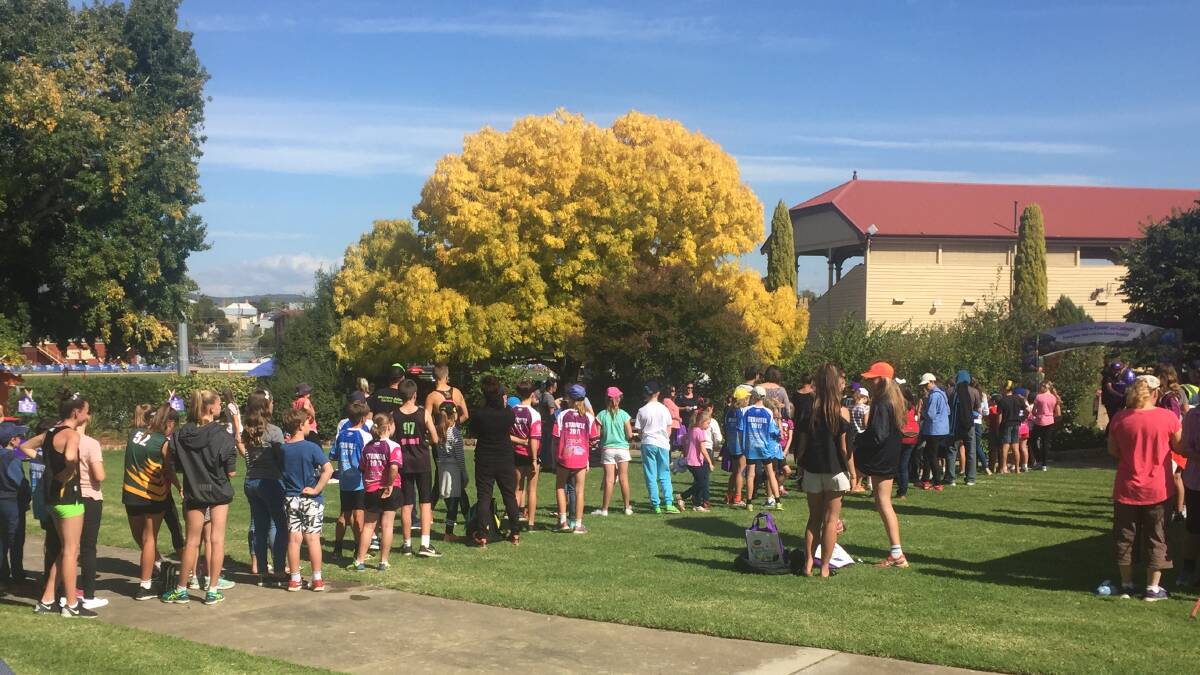 Children form long queues for Sunday's Easter Egg hunt at the Stawell Gift. 