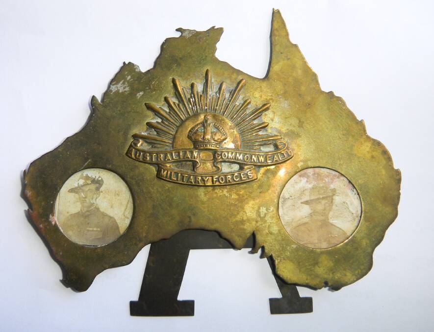 MYSTERY SOLVED: A wonderful and rare piece of trench art discovered in a fireplace carries the images of two WWI soldiers. 