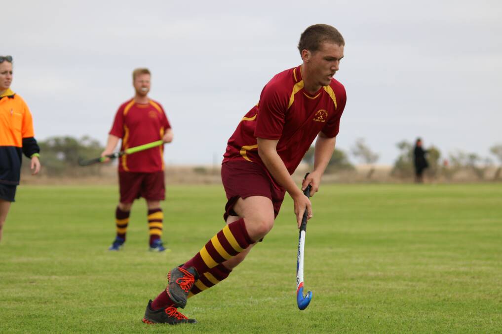 Warrack Hoops' Hamish Wagenknecht drives up the field. The Hoops and the Kaniva Conras are still in contention for top spot. Photo: SIMON KING