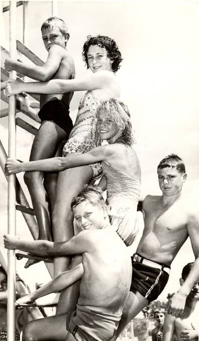 WHO ARE THEY: Can you identify the youngsters on the steps of the diving board in photo number HHS004463?