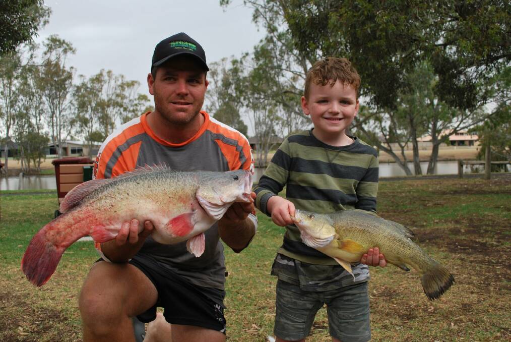 FISH: Justin Garth and son Blake scooped the pool in the Christmas competition.