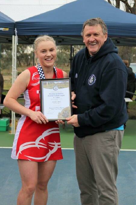 HONOUR: Jasmine Talbot, of Taylors Lake, is presented with her award by Horsham Blue Ribbon Foundation member Les Power.