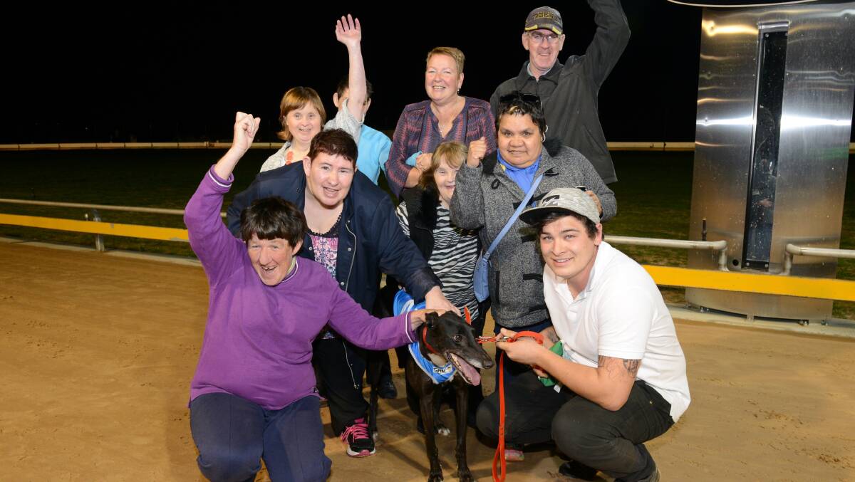 CELEBRATION: The Woodbine Recreation Program celebrating their win in The Great Chase. Heather Thomas can be seen in the centre of the group. Photo: supplied.