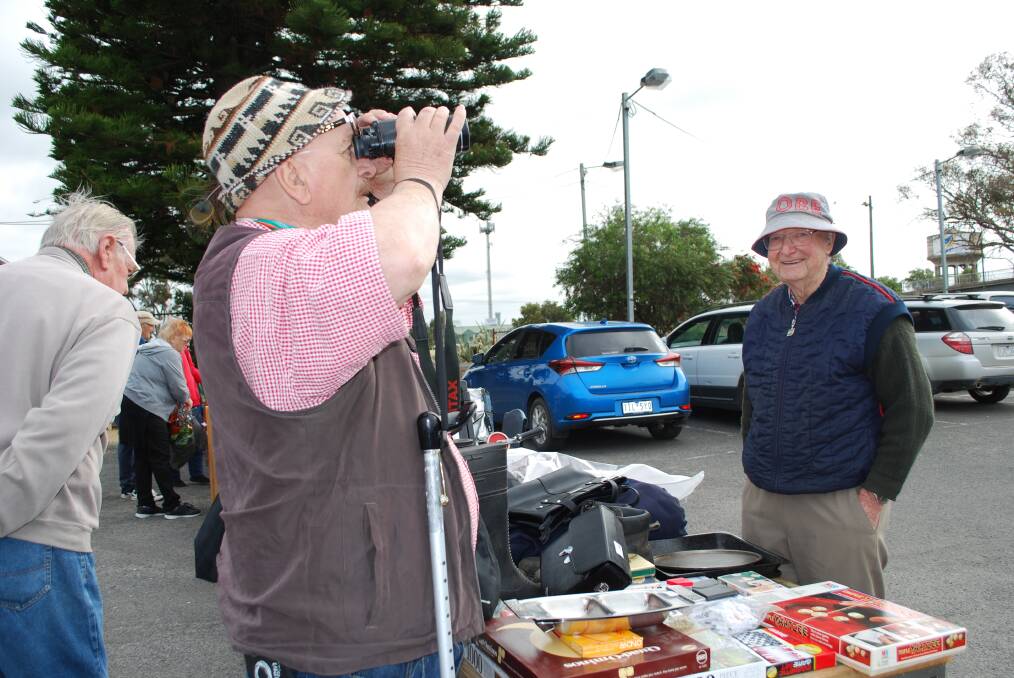 ON WATCH: U3A's Karl Kaucner watches on as someone tries out his wares.