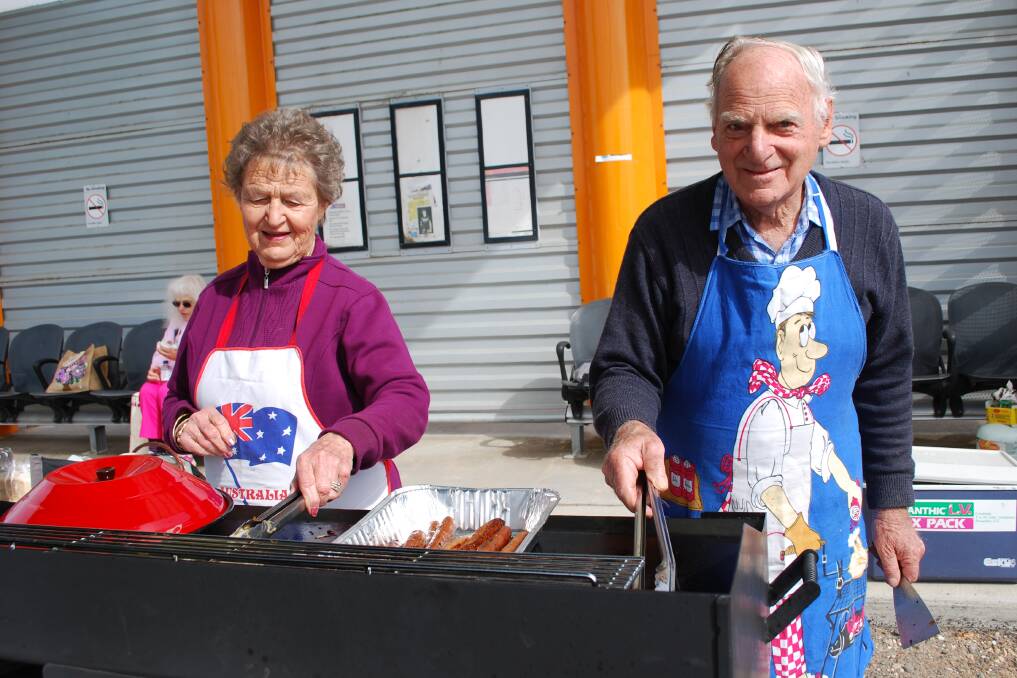 COOKING: Lorna and Gordon Rentsch man the barbecue at the U3A market day.