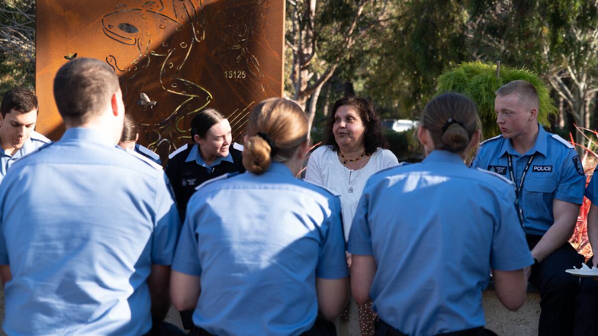 The WA Australian of the Year Mechelle Turvey (white top) trains police on how to deal with victims of crime. Picture supplied by australianoftheyear.org.au