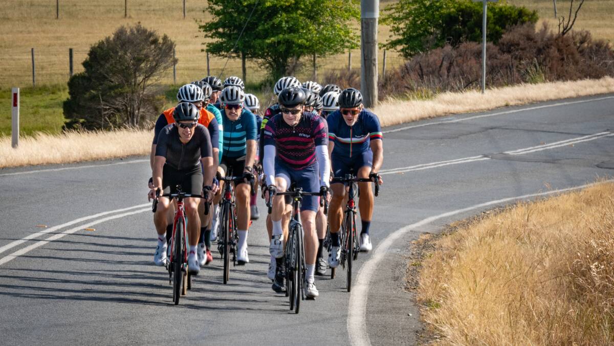 Richard Scolyer joins Richie Porte on a recent ride through Exeter in northern Tasmania. Picture by Paul Scambler/The Examiner 