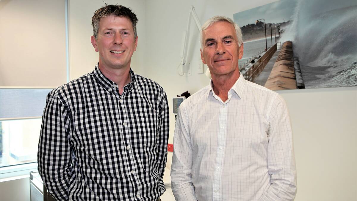 COMING AND GOING: Dr Cameron McPherson and Dr David Leembruggen at South West Medical Centre in Warrnambool. While Dr Leembruggen is retiring, Dr McPherson has begun work at the centre. 