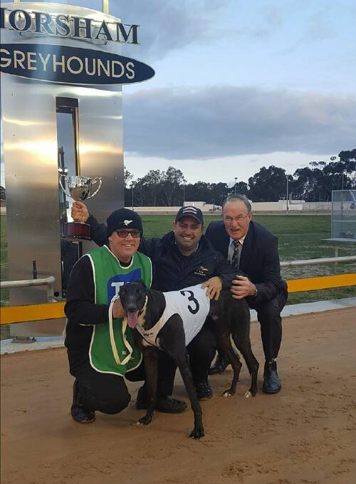Winning combination: 2017 President's Cup winner Crash Cobra with club president Ian Bibby, far right, and winning trainer Anthony Azzopardi centre.