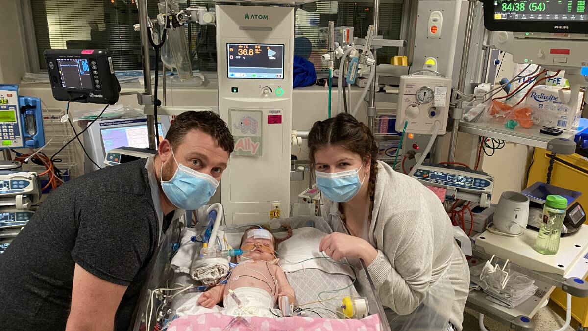 HOSPITAL STAY: Parents Joel and Molly Davis with baby Ally. Picture: supplied