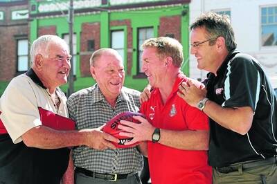 STRONG BOND: Homers premiership players Tom Parish, Ron Eastwell, Daryl Eastwell and Geoff Parish are looking forward to the club's reunion in June. Tom and Ron played in the club's 1965 premiership and their sons Daryl and Geoff played in the club's only other premiership in 1992. Picture: PAUL CARRACHER