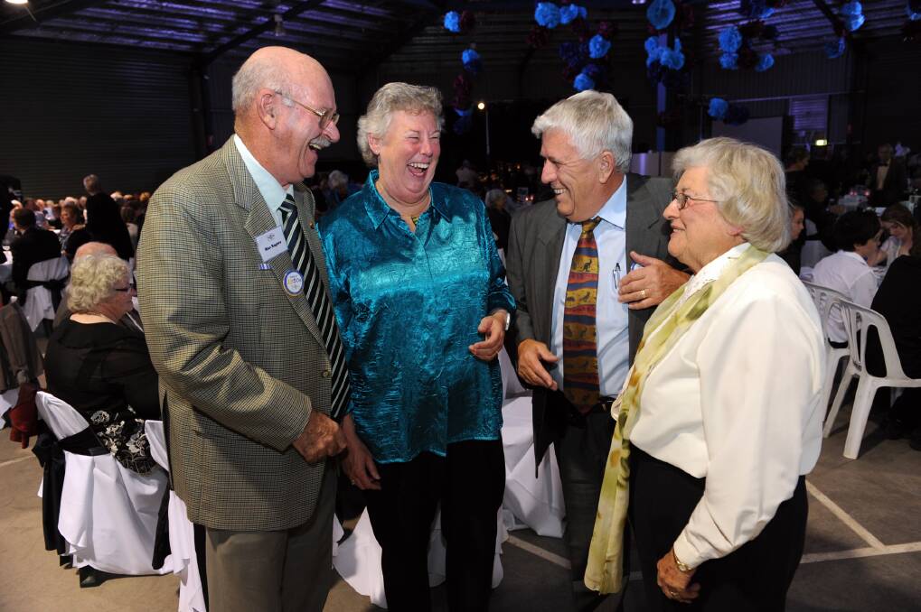 MEMORIES RE-LIVED: Max Rogers and Gwendolyne Rogers, Malcolm Ladlow amd Maureen Pope catch up at the Horsham College centenary gala dinner on Saturday night. Mr Rogers was Horsham High School head prefect in 1954. Pictures: Paul carracher