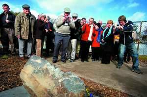 IMPORTANT: Part of the big crowd takes photos of the Dimboola train crash memorial unveiled by Horsham Mayor Gary Bird during an official ceremony yesterday. Picture: TRENT HORNEMAN