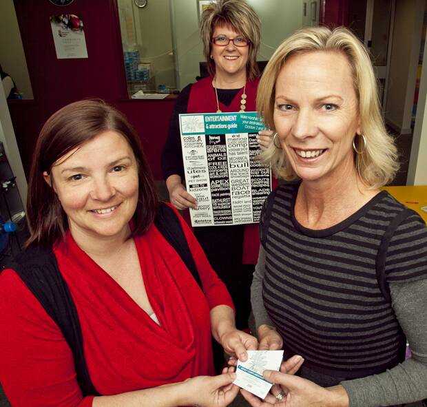 Business Horsham's Wendy Mitchell, right, gives Horsham Show tickets to Wimmera UnitingCare's Jane Freak. Picture: CONTRIBUTED 
