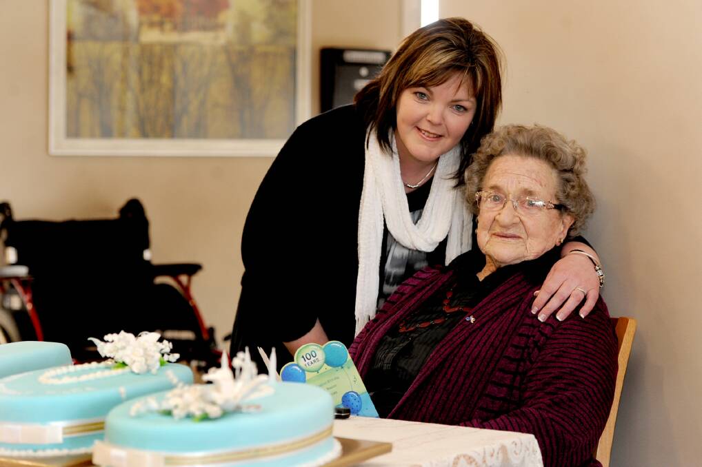 Taryn Carter of Kaniva celebrates grandmother Hilda Rogers' centenary in Horsham's Sunnyside Lutheran Retirement Village on Wednesday.